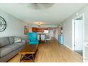 Spacious open-concept living room flows into dining area and kitchen, perfect for entertaining at 1903 S Ocean Blvd. S # 808, North Myrtle Beach, SC 29582