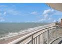 Scenic oceanfront view from a private balcony, showcasing the tranquil beach and horizon at 201 S Ocean Blvd. # 1112, Myrtle Beach, SC 29577