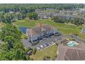 Expansive aerial shot of the condo, featuring golf course views and proximity to a pond and pool at 2241 Waterview Dr. # 537, North Myrtle Beach, SC 29582