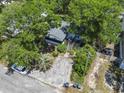 A high angle shot of the property with a spacious parking area and a screened-in porch at 2425 Park St., North Myrtle Beach, SC 29582