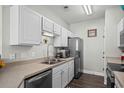 Efficient kitchen with stainless steel appliances and ample cabinet space at 4933 Crab Pond Ct. # 201, Myrtle Beach, SC 29579