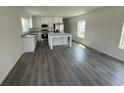 Bright kitchen featuring stainless appliances, a center island and light countertops at 504 King Air Ct, Myrtle Beach, SC 29577
