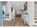 Inviting foyer with light hardwood floors leading to the open living area at 915 Palmetto St., Georgetown, SC 29440