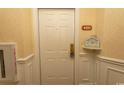 Condo hallway featuring unit number, welcome sign and fire extinguisher at 2241 Waterview Dr. # 315, North Myrtle Beach, SC 29582