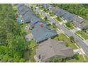 Aerial view of a residential neighborhood showcases the home's location within a landscaped community at 3620 Diamond Stars Way, Little River, SC 29566