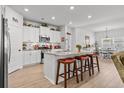 A spacious kitchen featuring a center island with seating, modern appliances, and ample cabinet space at 4000 Da Vinci Dr., Myrtle Beach, SC 29579