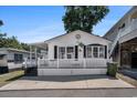 Inviting home with white railings and black shutters for a neat, coastal vibe at 6001-1833 S Kings Hwy., Myrtle Beach, SC 29575