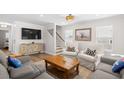 Stylish living area with comfortable seating, modern decor, and hardwood floors at 108 N Oak Dr., Surfside Beach, SC 29575