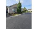 Well-kept brick home with manicured landscaping and curb appeal at 1426 Saint Thomas Circle # A 3, Myrtle Beach, SC 29577