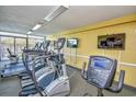 Well-equipped gym featuring modern treadmills, elliptical machines, and wall-mounted televisions at 1501 S Ocean Blvd. # 1232, Myrtle Beach, SC 29577