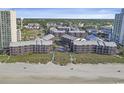An aerial view of a beachside condo community, featuring easy beach access and beautiful coastal views at 207 N 3Rd Ave. N # 247, North Myrtle Beach, SC 29582