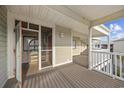 Relaxing condo balcony offering exterior storage, carpeting, and weather coverage from the elements at 210 N Ocean Blvd. # 333, North Myrtle Beach, SC 29582