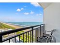 Relax on this beautiful balcony with ocean views and comfortable seating at 3000 N Ocean Blvd. N # 1401, Myrtle Beach, SC 29577