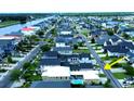 Aerial view of a lovely coastal community featuring waterfront access and charming homes at 451 W Palm Dr., Myrtle Beach, SC 29579