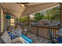 Relaxing front porch with comfortable seating, perfect for enjoying a cup of coffee at 6001-5742 S Kings Hwy., Myrtle Beach, SC 29575