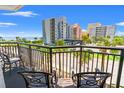 Relax on the balcony with views of the ocean and neighboring buildings at 7100 N Ocean Blvd. N # 321, Myrtle Beach, SC 29572