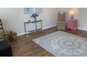 Cozy living room with hardwood floors, area rug, and stylish decor at 739 Shell Creek Circle # 739, North Myrtle Beach, SC 29582