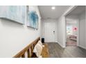 Bright entryway featuring stylish bench seating and artwork leading into a bedroom with natural light at 78 Ashworth Dr., Tabor City, NC 28463