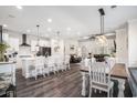 Open concept with island kitchen, stainless steel appliances, and an adjacent dining area at 1114 Wigeon Dr., Conway, SC 29526
