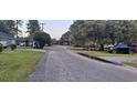 Peaceful street view showcases the quiet residential neighborhood at 289 Whites Creek Rd., Georgetown, SC 29440