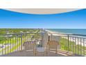 Enjoy panoramic ocean and city views from this spacious balcony with seating at 304 N Ocean Blvd. # 1113, North Myrtle Beach, SC 29582