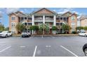 Spacious condominium complex with ample parking and manicured landscaping for a beautiful community at 4633 Lightkeepers Way # 5-F, Little River, SC 29566