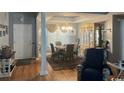 Inviting dining room with modern lighting, round table, and stylish decor at 550 Bridgeport Dr., Myrtle Beach, SC 29577