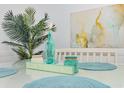 Cozy dining area decorated with beach-themed accents and bright natural light at 5905 S Kings Hwy. # 344B, Myrtle Beach, SC 29575