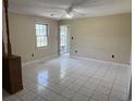 Inviting living room with tile flooring, a ceiling fan, and neutral walls at 1002 S Beech Ave., Andrews, SC 29510