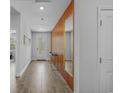 Well-lit entryway with modern wood accents, stylish flooring, and a console table at 1168 Baker Creek Loop, Myrtle Beach, SC 29579