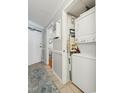 Hallway leading to in-unit laundry area at 1210 N Waccamaw Dr. # 1105, Murrells Inlet, SC 29576