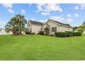 Well maintained single-story home with large front yard and manicured landscaping at 196 La Patos Dr., Myrtle Beach, SC 29588