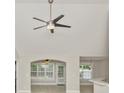 Bright living room boasting a ceiling fan, plenty of natural light, and an open-concept design at 231 Marbella Dr., Murrells Inlet, SC 29576
