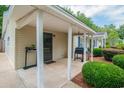 Inviting covered porch with grill and ample space at 2510 Redwood St., Georgetown, SC 29440