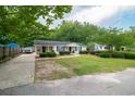 Inviting one-story home with a spacious driveway and lush green lawn at 2510 Redwood St., Georgetown, SC 29440