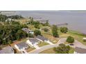 Scenic aerial view showcasing the waterfront community, docks, lush greenery, and neighborhood pool at 2609 Seaport Circle, Georgetown, SC 29440