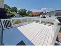 Large back deck perfect for entertaining with white railing and space for outdoor seating at 302 Silver Fox Trail, Myrtle Beach, SC 29588