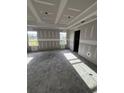 Bedroom under construction, features lots of natural light through its multiple windows at 3444 Asbury Rd., Aynor, SC 29511