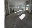Spacious unfinished living room with lots of windows and an open concept floorplan at 3530 Good Luck Rd., Aynor, SC 29511