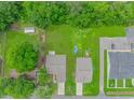 Aerial view of the property showcasing the yard, driveway, and proximity to neighborhood at 3539 Harrelson Ave., Loris, SC 29569