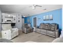Bright living room featuring stylish furniture and an open view of the kitchen at 502 Garden Dr., Surfside Beach, SC 29575