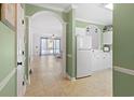 Inviting entryway featuring an archway, tiled floors, and access to a living room and kitchen at 5825 Catalina Dr. # 124, North Myrtle Beach, SC 29582