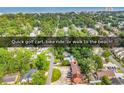 Aerial view of the townhouse complex, surrounded by lush trees and close proximity to the beach at 633 Sparrow Dr. # B, Surfside Beach, SC 29575