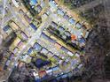 Aerial view of a well-planned residential community with tree-lined streets at 8151 Woodland Dr., Myrtle Beach, SC 29588
