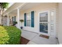 Charming entrance featuring a 'hello' mat and blue shutters at 908 Wrigley Dr. # 17-3_17-3G, Myrtle Beach, SC 29588