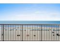 Oceanfront balcony view with beach access, clear blue sky, and plenty of beach space at 9550 Shore Dr. # 529, Myrtle Beach, SC 29572