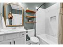 This bathroom offers a shower, shelving, and elegant fixtures at 103 Pigeon Forge Ct., Murrells Inlet, SC 29576