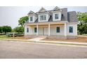 New construction home featuring a brick foundation, covered porch, and gable roof at 105 Michau Rd., Georgetown, SC 29440