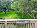 Scenic backyard view of lush greenery and trees from an outdoor balcony at 108 Westhill Circle # 7-E, Myrtle Beach, SC 29572