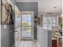 A welcoming entryway features neutral colors, a ceramic tile floor, and artwork at 117 Butkus Dr. # 6, Myrtle Beach, SC 29588